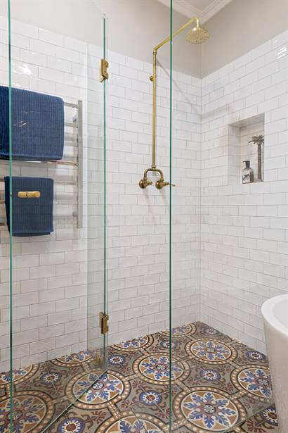 Custom made brass exposed shower rose & tapware.