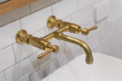 Custom made brass wall mounted vanity tapware