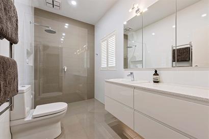 Modern bathroom in neutral tones with large shower