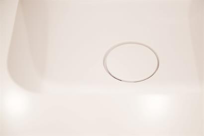 Corian vanity waste cover in Designer White