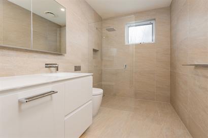Custom made vanity with 12mm Designer White Corian top & recessed mirrored wall cabinet, Milli: Glance wall basin mixer set.