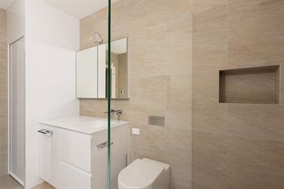 Recessed shower shelf, frameless Superclear low iron shower panel.