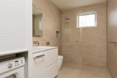 Tambortech: Roller Door access to washing machine