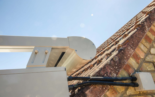 Close up of the roof blind cassette and cables at the eaves