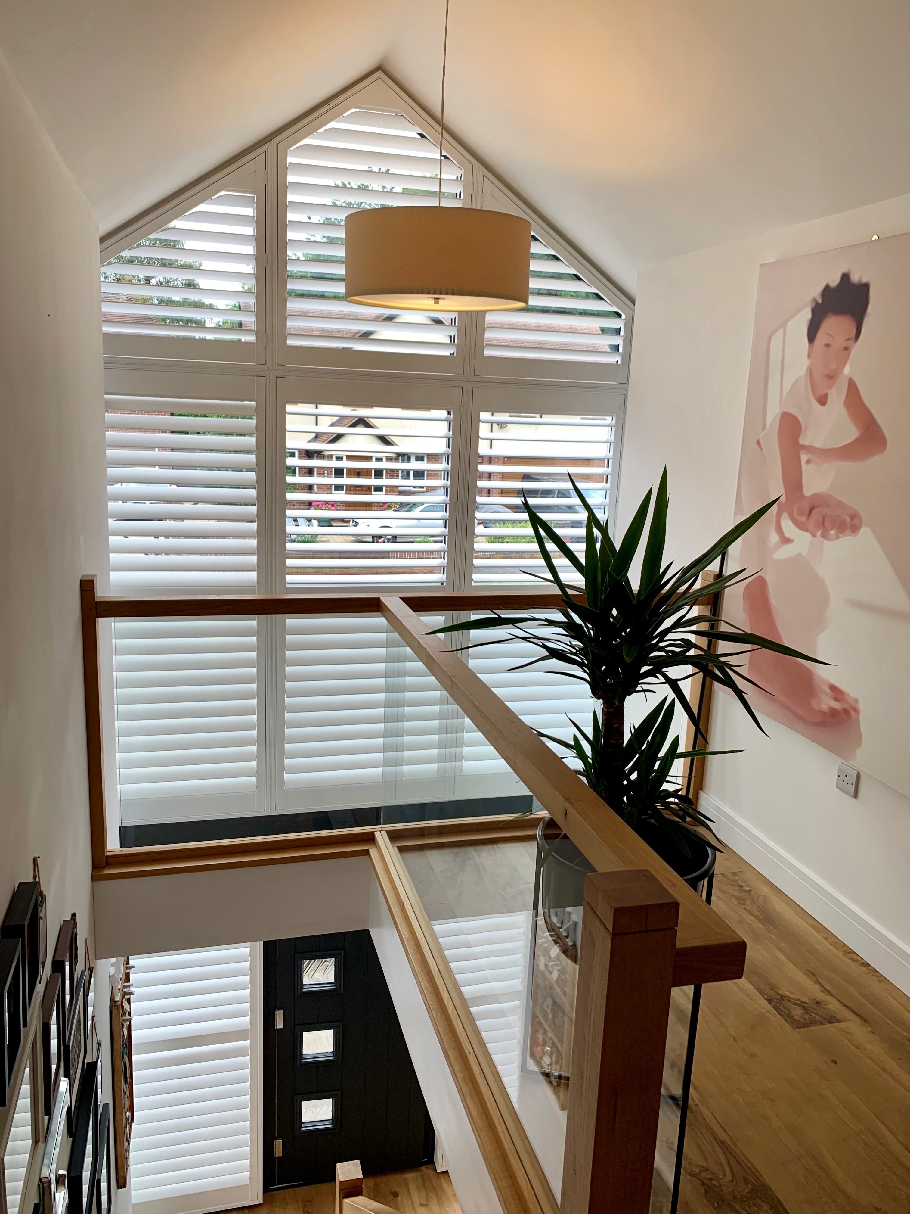 White shutters on a landing apex window