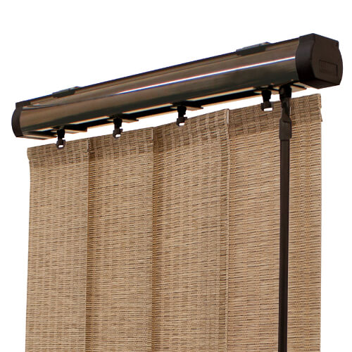 Woven natural vertical blinds on a brown headrail
