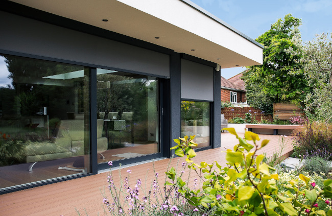 External blind lowered beside patio doors