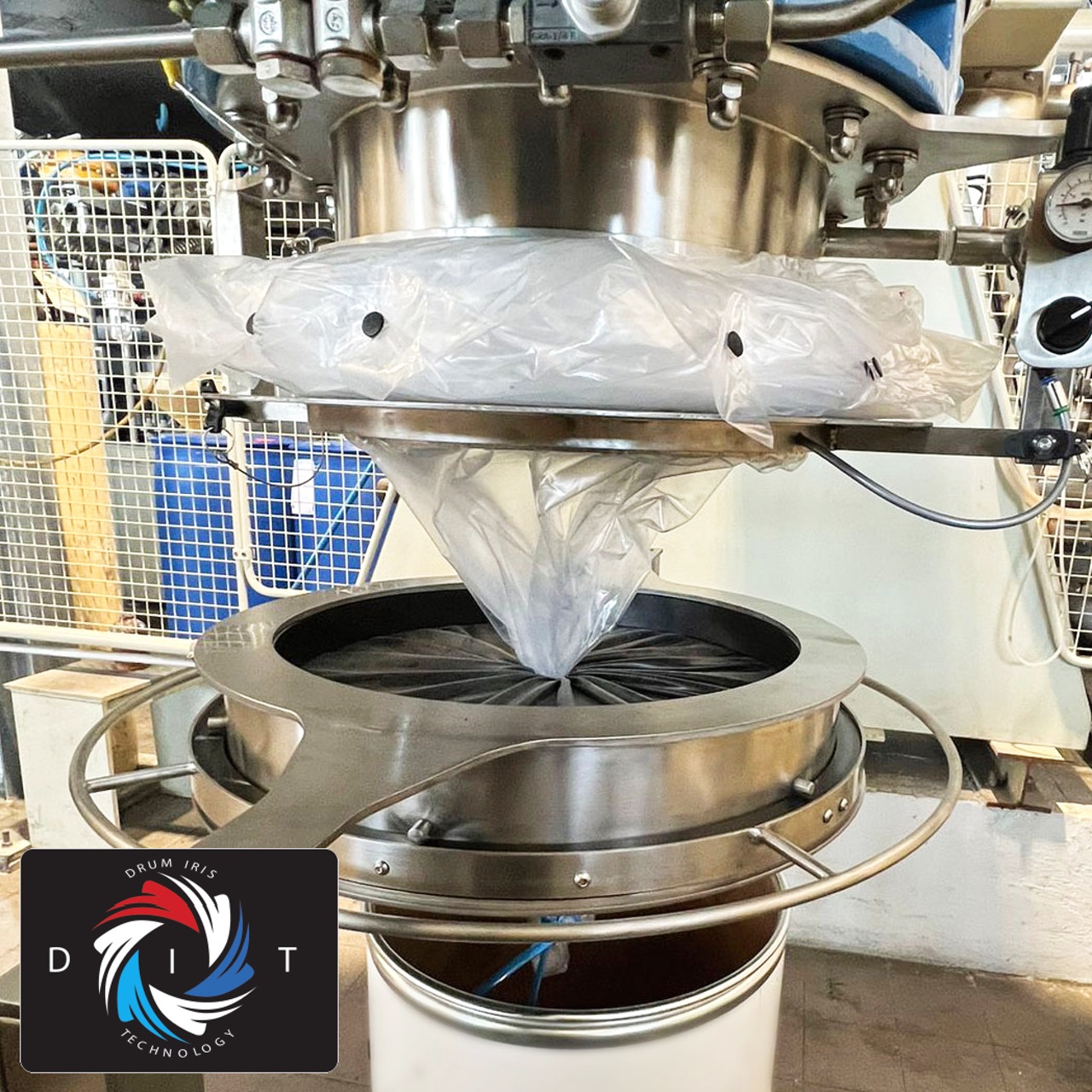 system for dosing from a donut liner through a drum iris into a drum