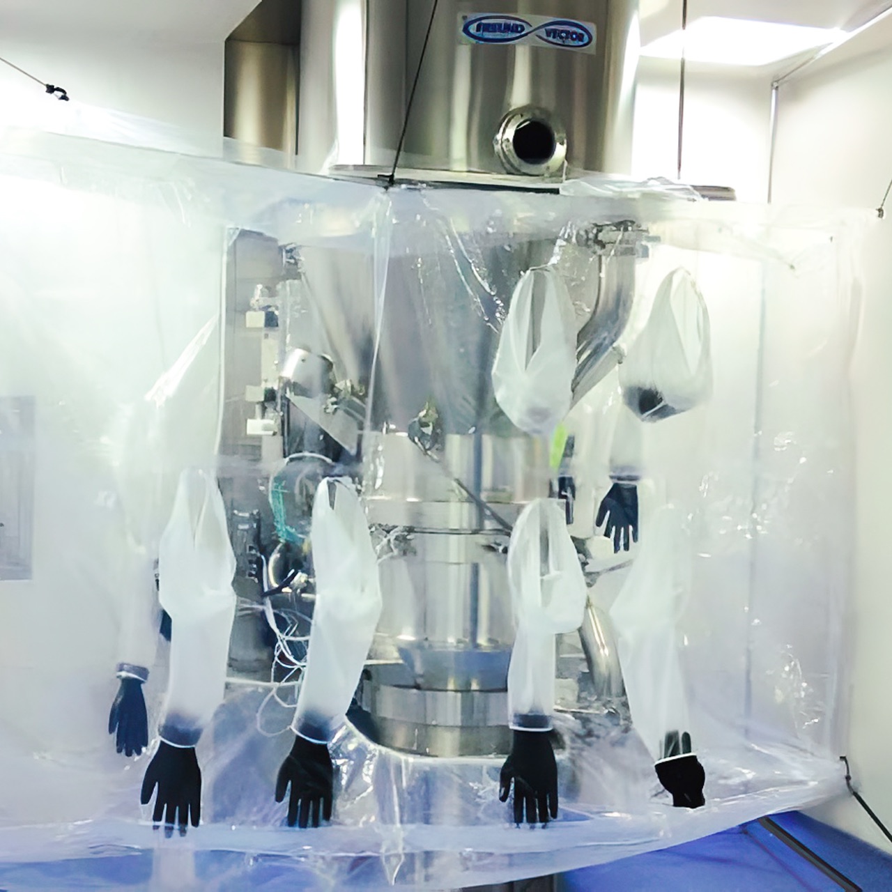 glove bag system covering fluid bed dryer