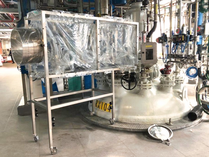 flexible glove bag attached to reactor