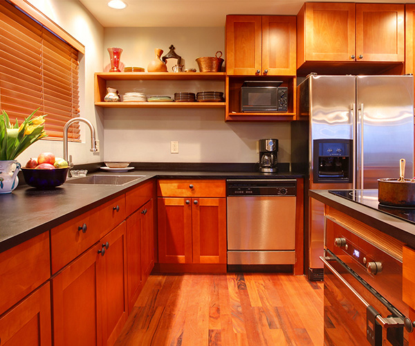 kitchen with wood cabinets and floors