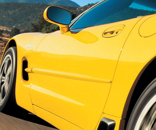side of yellow sports car