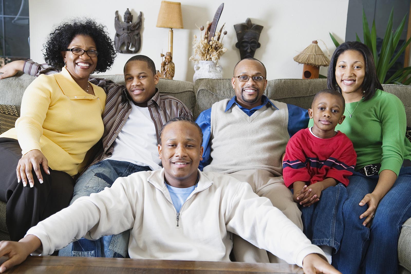 African-American family of six at home in their family room