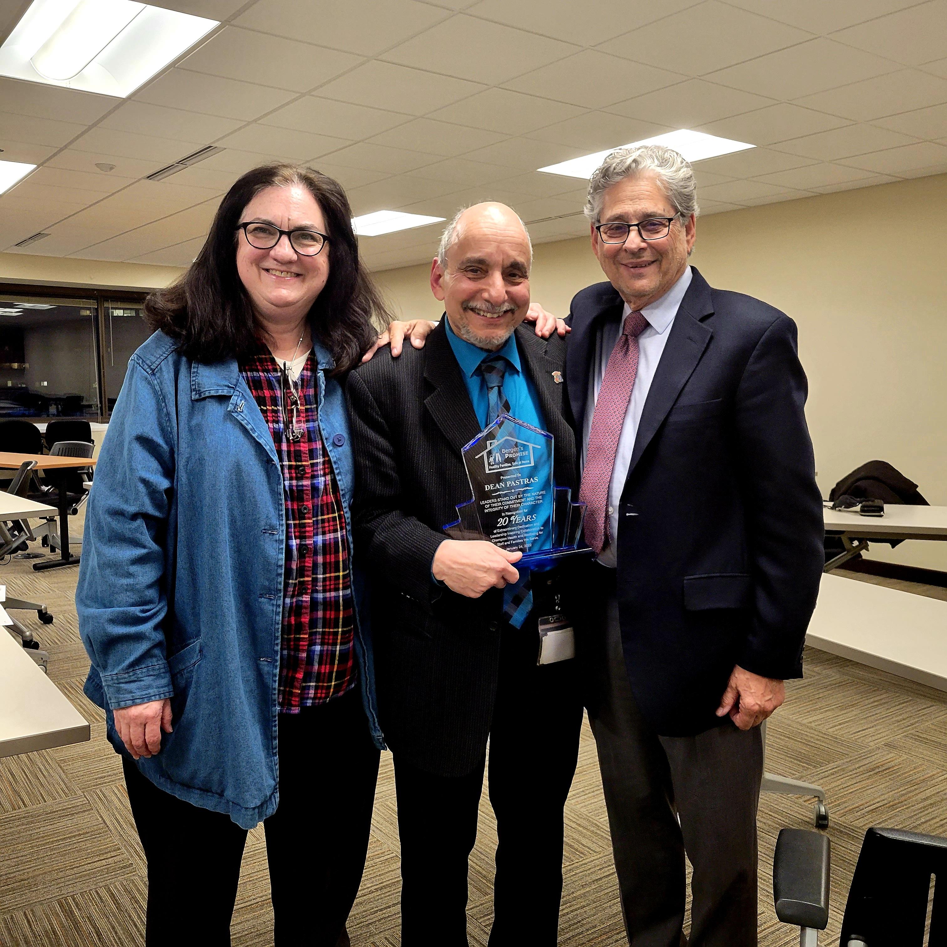 Dean presented with award from Board