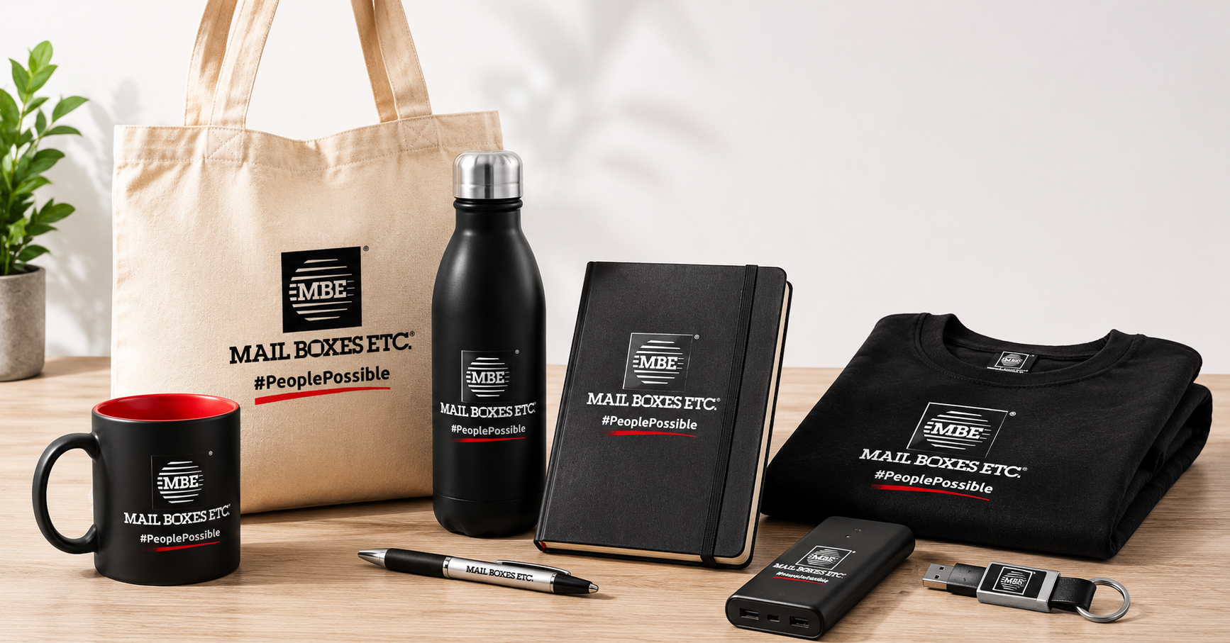 Objets publicitaires personnalisés MBE Martinique : mug, tote bag, gourde, carnet, stylo et textile