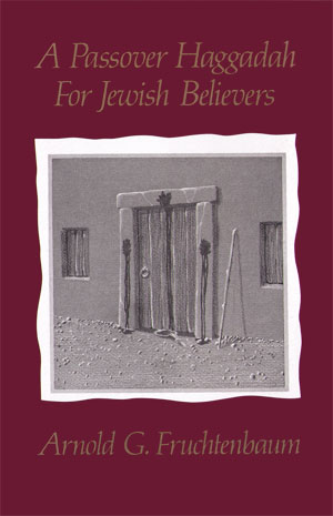 Cover of 'A Passover Haggadah for Jewish Believers' by Dr. Arnold Fruchtenbaum, showing a red cover with a grey image. 