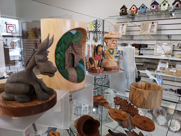 display of art objects on shelves