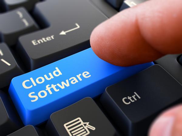 finger pushes blue button cloud software