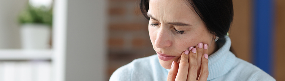 Woman with tooth sensitives