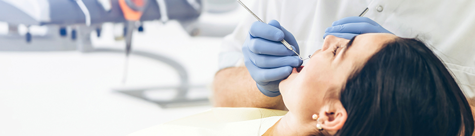Woman receiving emergency dental care