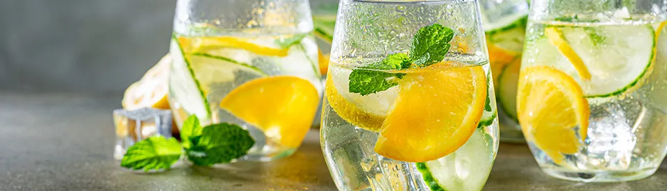 lemon water drinks on table