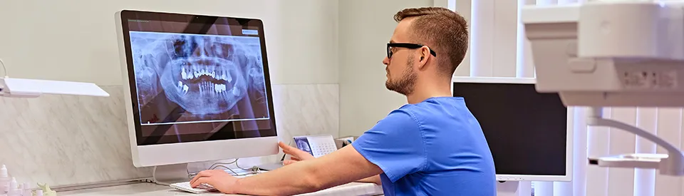 dentist using computer