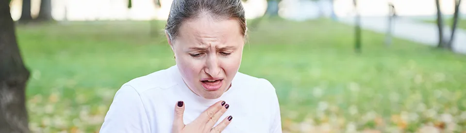 woman looks like she has a bad tatse in mouth