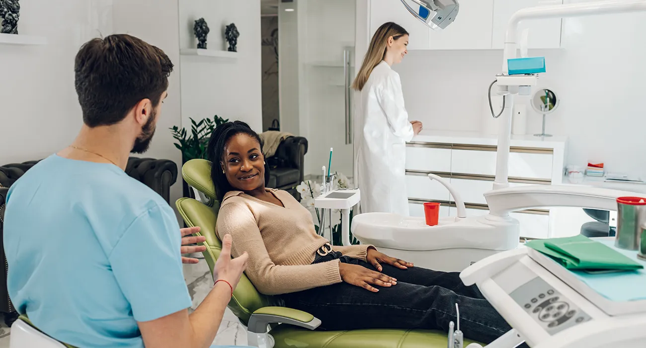 woman consulting with dentist
