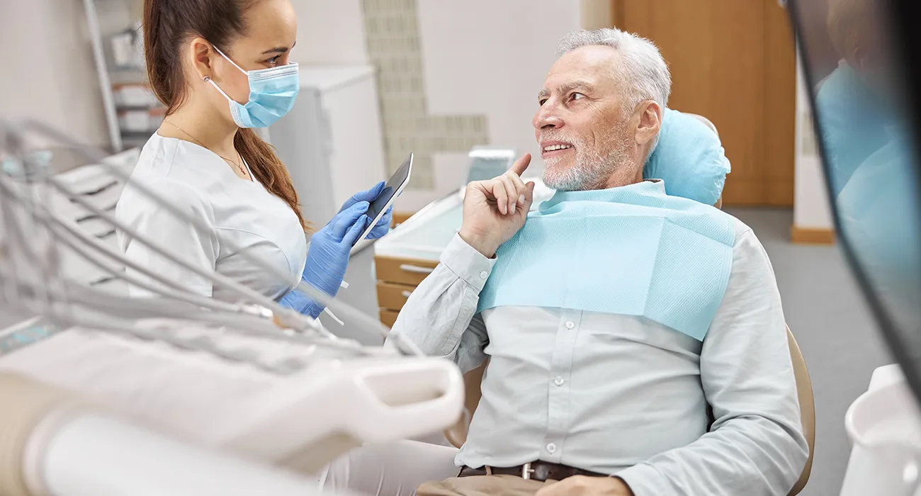 dentist consulting with patient