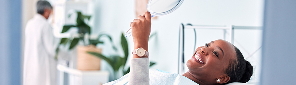 Smile, mirror and black woman at dentist on chair in clinic