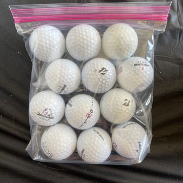 12 Bridgestone golf balls 