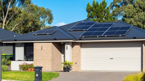 Standing seam metal roof with solar panels