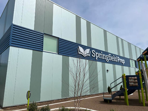 Building clad in recyclable metal panels
