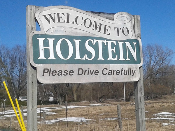 Welcome to Holstein road sign