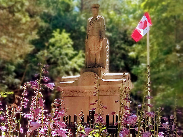 Eugenia Cenotaph with Canadian flag