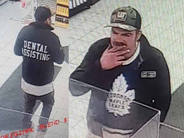 Man with Toronto Maple leafs jersey, jacket says Dental Assisting.