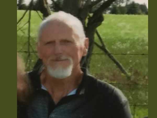 Robert Hamilton photo with grey hair moustache and goatee.