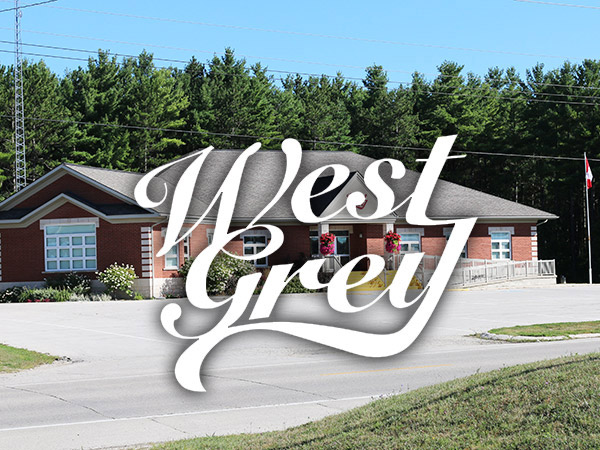 West Grey logo over building in background.