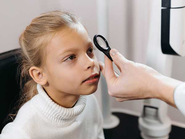 A child having her vision tested