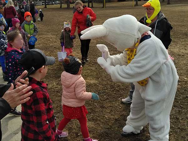 Easter bunny giving a high five