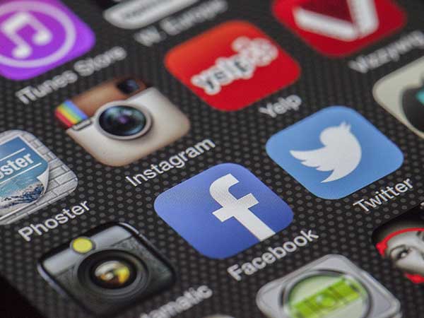 Social media favicons on phone screen