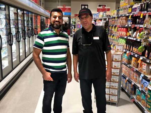 Canadian newcomer Mostafa has retained full-time employment at a local grocery store, thanks to the YMCA Grey Bruce Settlement and Language Services.