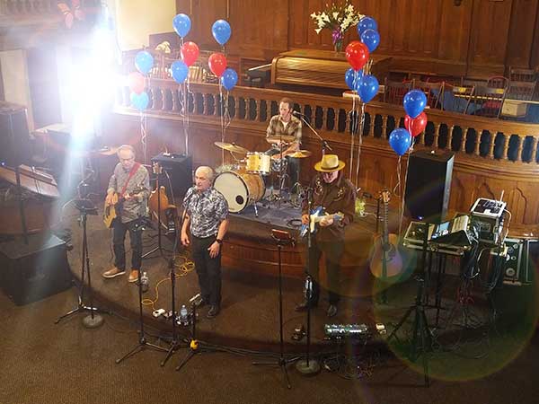 Bored of Education band performing at Annesley United Church