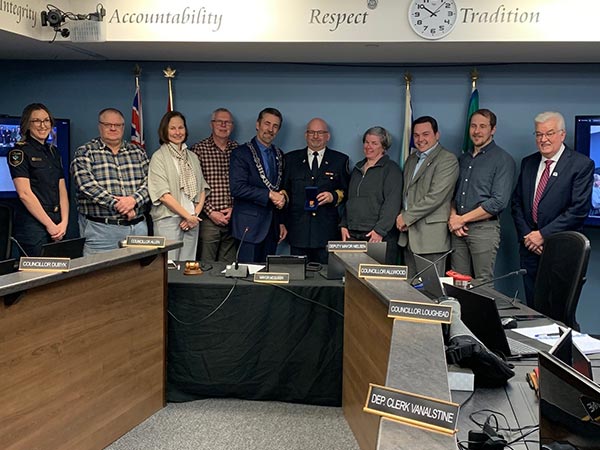 Fire Chief Wellwood honoured with award.