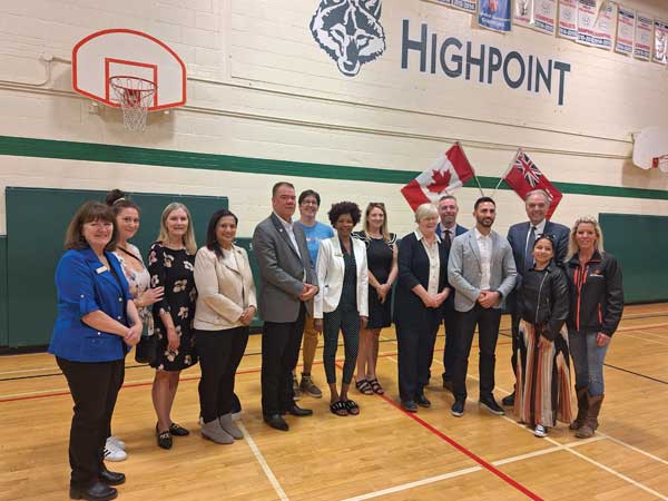 Dignitaries gathered at the new Dundalk school announcement at Highpoint Community School.