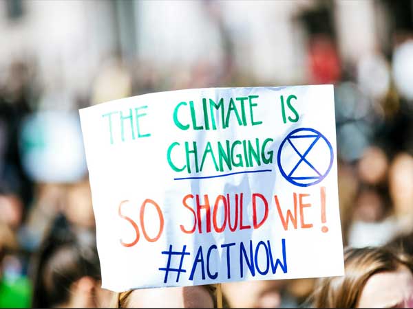 Climate action protest sign