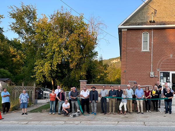 Ribbon cutting in front of Kimberley Hall.