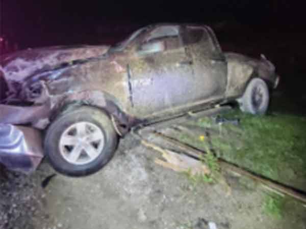 Pickup truck crashed on road.