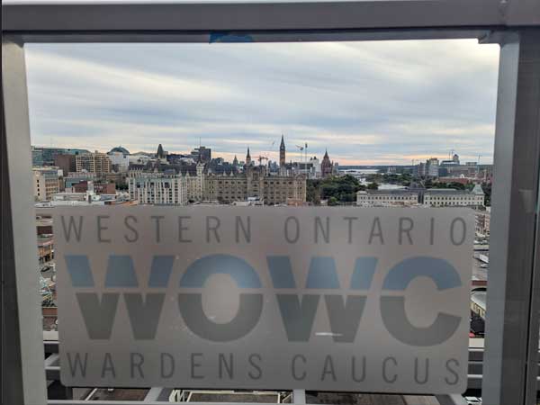 WOWC logo on a window overlooking the city