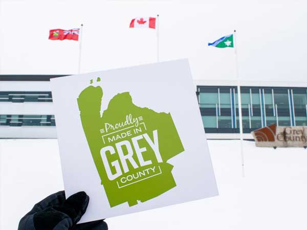 Proudly Made in Grey sign.